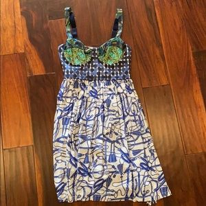 Size is L but fits like a small/0-2.